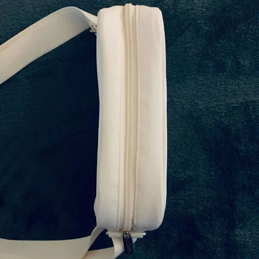 NWT Gorgeous Biossance White/ Ivory Satin Light Cushion adjustable crossbody bag